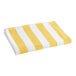 An Oxford Playa yellow and white striped pool towel.