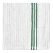 A close up of a white towel with green stripes.