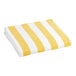 An Oxford Playa yellow and white striped pool towel.