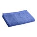 An Oxford blue pool towel folded on a white background.