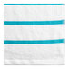 An aqua pool towel with white stripes.
