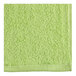 An apple green Oxford pool towel.