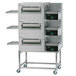 A Lincoln Impinger II triple stacked electric conveyor oven with three shelves.