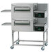 Two large stainless steel Lincoln Impinger conveyor ovens.