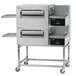 A double stacked Lincoln Impinger conveyor oven with a stainless steel exterior.