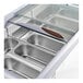 An Avantco gelato dipping cabinet with a glass top and silver trays inside.