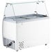 An Avantco white ice cream dipping cabinet with a flat glass top.