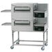 Two large stainless steel Lincoln Impinger conveyor ovens.