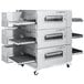 A large stainless steel Lincoln Impinger conveyor oven with shelves.