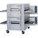 A double stacked Lincoln Impinger conveyor oven with metal doors.