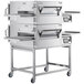 A Lincoln Impinger II double stacked conveyor oven with drawers on wheels.