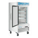 An Avantco white merchandiser refrigerator with a glass door.