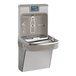 A Zurn Elkay stainless steel drinking fountain and bottle filler with a bottle on the front.