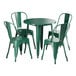 A Lancaster Table & Seating emerald green table with 4 chairs on a outdoor patio.