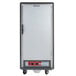 A large grey Metro C5 heated holding cabinet with a solid door.