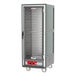 A gray Metro C5 heated holding cabinet on wheels.