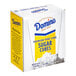 A white and yellow box of Domino sugar cubes.