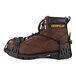 An Ergodyne TREX slip-resistant traction device attached to a brown work boot.