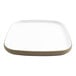A white square cheforward melamine plate with a tan border.
