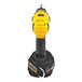A close-up of a yellow and black Ergodyne Squids power tool trap on a yellow and black drill.