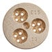 A gold plated circular metal bigoli pasta die with four holes in it.