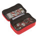 A red Ergodyne Arsenal Buddy organizer with a lock and key.