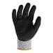 A pair of gray and black gloves with a sandy orange palm coating.