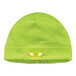 A close-up of an Ergodyne N-Ferno hi-vis lime skull cap with LED lights on.