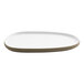 A white oval tray with a tan edge.