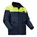 An Ergodyne N-Ferno men's winter jacket in navy blue and yellow with reflective accents.