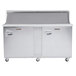 A Traulsen stainless steel refrigerated sandwich prep table with two right hinged doors.