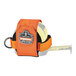 An orange and black Ergodyne tape measure holder with a belt clip holding a tape measure.