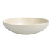 A white Cloud Terre by Fortessa pasta bowl with a textured surface and a small rim.