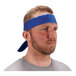 A man wearing a blue Ergodyne evaporative cooling bandana on his head.