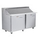 A Traulsen stainless steel refrigerated sandwich prep table with two left hinged doors.