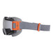 Ergodyne Skullerz safety goggles with a grey frame and orange strap.