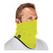 A person wearing a Hi-Vis lime yellow fleece neck gaiter.