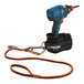 A cordless drill tethered with a Squids tool tether kit.