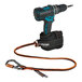 An Ergodyne Squids tool tethering kit with a blue and black drill tethered to a cordless drill.