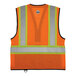 An Ergodyne hi-vis orange mesh safety vest with black front panel and reflective stripes.