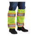 A person wearing Ergodyne hi-vis lime leg gaiters with reflective tape over pants.