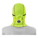 A man wearing an Ergodyne lime green fleece balaclava under a yellow hoodie.