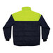 An Ergodyne navy blue and yellow insulated freezer jacket with reflective accents.