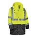 A yellow and black Ergodyne GloWear 4-in-1 winter jacket with a black front panel.