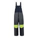 Navy and hi-vis yellow Ergodyne insulated bib overalls with reflective accents.