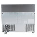 A stainless steel Traulsen refrigerated sandwich prep table with left and right hinged doors.
