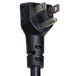 A close-up of a black power plug with two plugs on it.