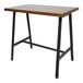 A BFM Seating black powder-coated steel A-frame table base with black legs for a wooden table top.