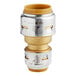 A SharkBite brass push-to-connect reducing coupling with gold and silver threaded connectors and a yellow cap.