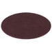 A round, maroon Scrubble conditioning floor pad.